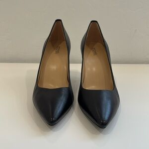 Brand new Michael Kors 3” black leather pumps. Size 10M.